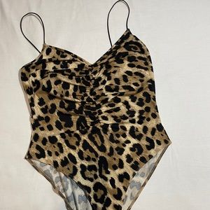 Leopard print bodysuit.